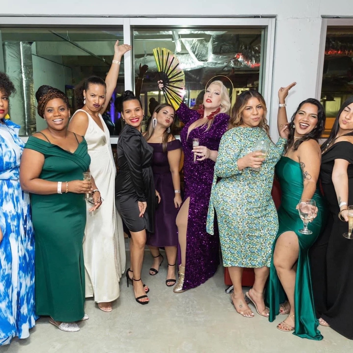 Guests in evening wear at a Curations By Ev gala