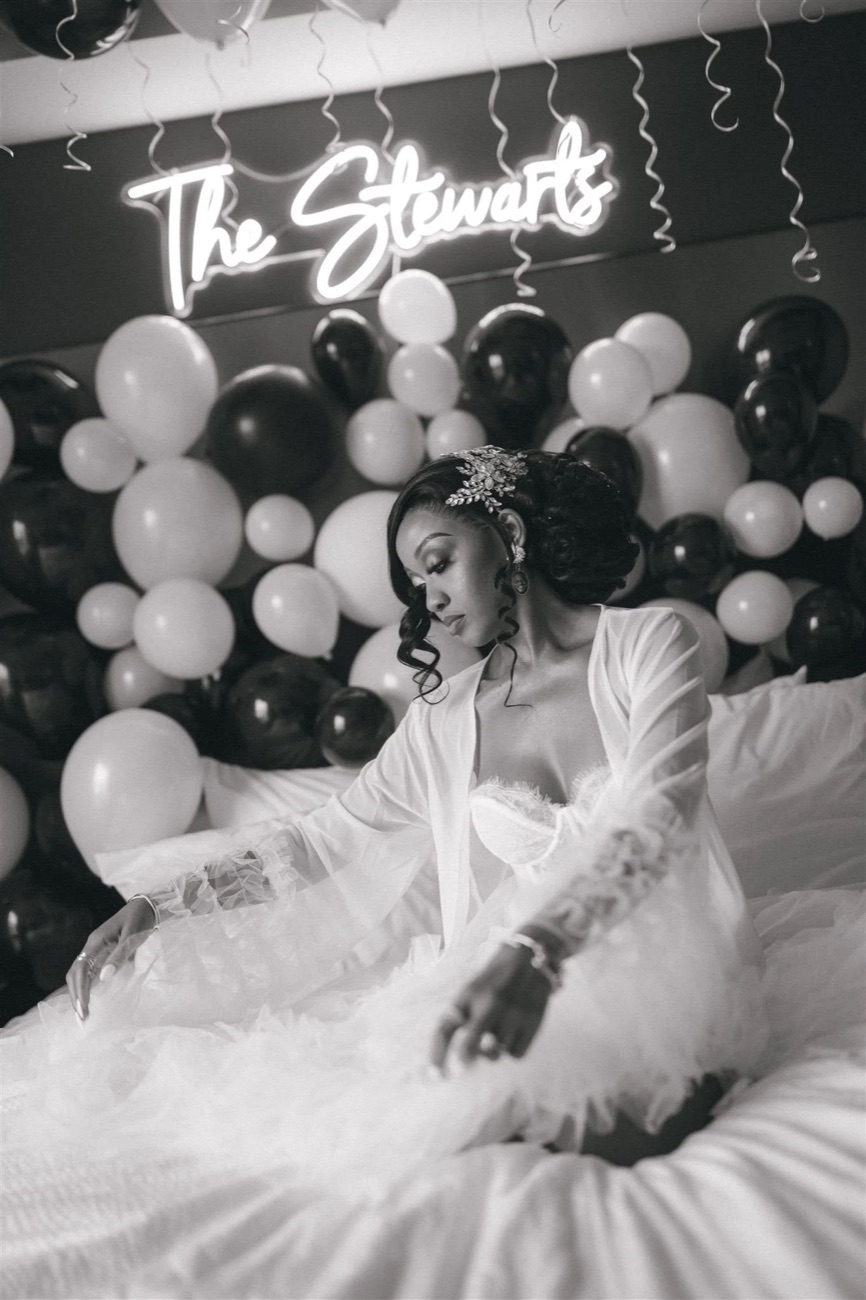 A bride photographed in her wedding suite